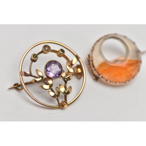 168 - TWO EARLY 20TH CENTURY BROOCHES, the first a circular agate brooch set in a rose metal, fitted with ... 