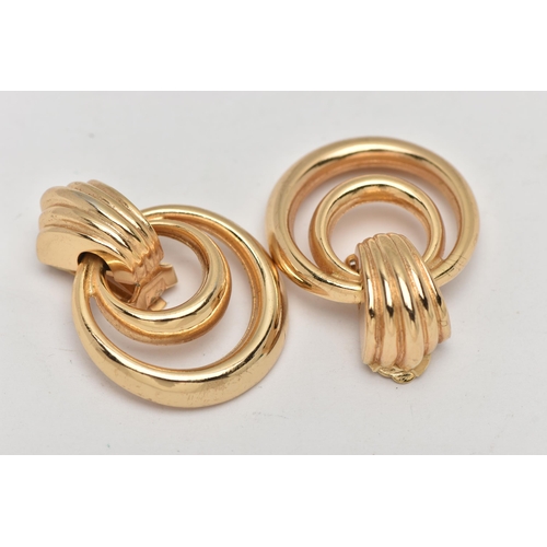 169 - A PAIR OF 'CHRISTIAN DIOR' CLIP ON EARRINGS, knocker style hoop earrings in gold tone, fitted with c... 