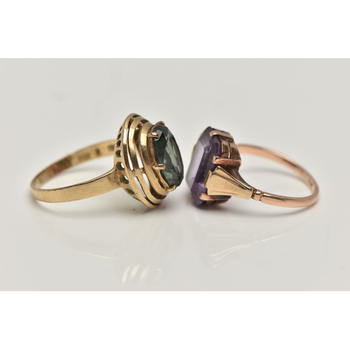 174 - TWO GEM SET RINGS, the first a yellow metal dress ring, set with a green synthetic spinel, stamped 3... 