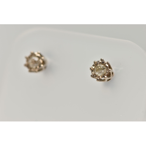 180 - A PAIR OF DIAMOND SINGLE STONE EARRINGS, each ear stud set with an old European cut diamond, within ... 