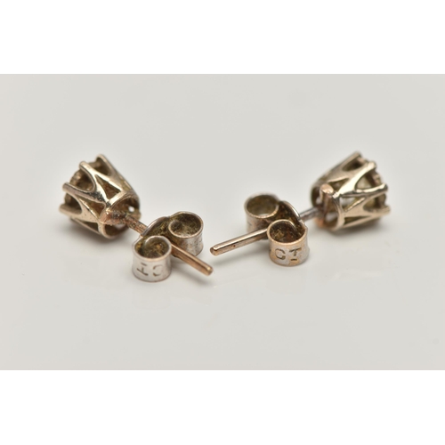 180 - A PAIR OF DIAMOND SINGLE STONE EARRINGS, each ear stud set with an old European cut diamond, within ... 