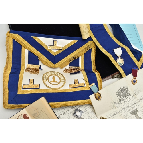 195 - A BRIEFCASE AND MASONIC REGALIA, brown briefcase together with a blue, white and gold detailed 'Worc... 