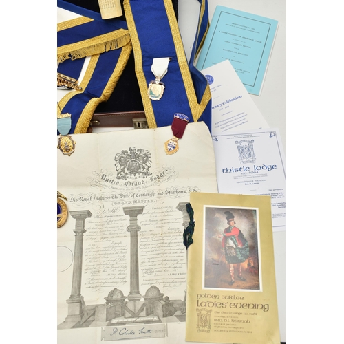 195 - A BRIEFCASE AND MASONIC REGALIA, brown briefcase together with a blue, white and gold detailed 'Worc... 