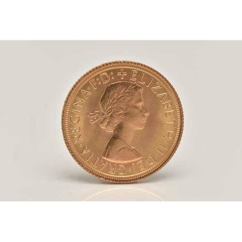 23 - AN ELIZABETH II FULL GOLD SOVEREIGN COIN, depicting George and the Dragon dated 1965, approximate di... 