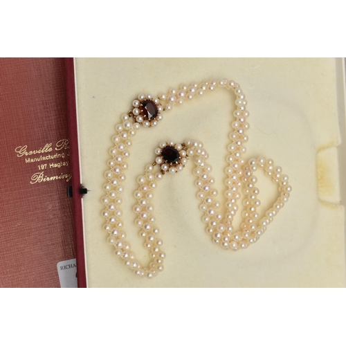 26 - A CULTURED PEARL CHOKER AND BRACELET, designed as a row of three cultured cream pearls with a pink h... 