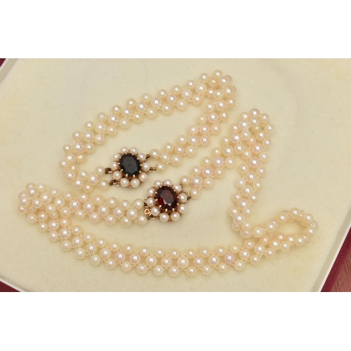 26 - A CULTURED PEARL CHOKER AND BRACELET, designed as a row of three cultured cream pearls with a pink h... 