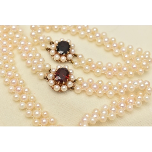 26 - A CULTURED PEARL CHOKER AND BRACELET, designed as a row of three cultured cream pearls with a pink h... 