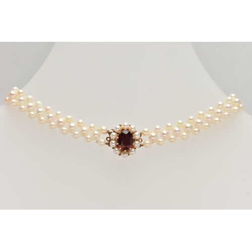 26 - A CULTURED PEARL CHOKER AND BRACELET, designed as a row of three cultured cream pearls with a pink h... 