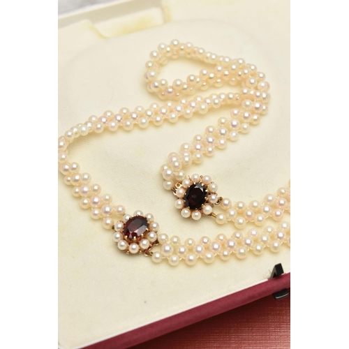 26 - A CULTURED PEARL CHOKER AND BRACELET, designed as a row of three cultured cream pearls with a pink h... 