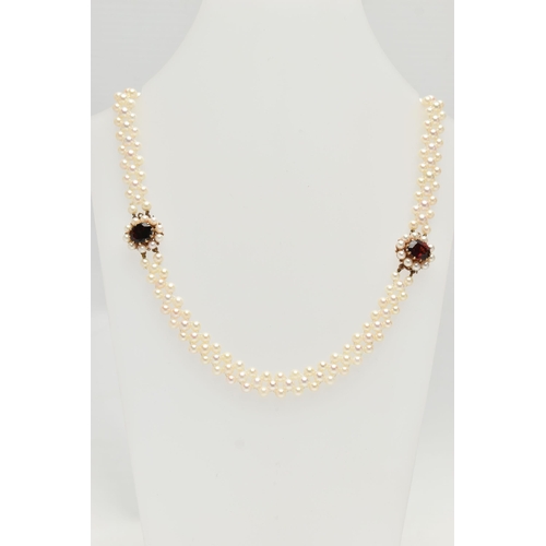 26 - A CULTURED PEARL CHOKER AND BRACELET, designed as a row of three cultured cream pearls with a pink h... 