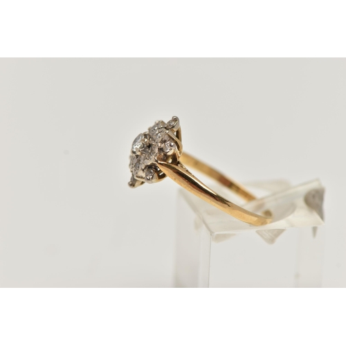 33 - AN 18CT GOLD DIAMOND CLUSTER RING, flower shape cluster ring set with a central round brilliant cut ... 