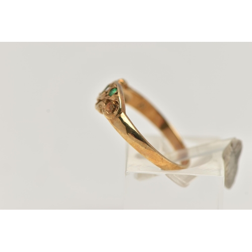 34 - A 9CT GOLD EMERALD AND DIAMOND RING, set with three circular cut emeralds, interspaced with two star... 