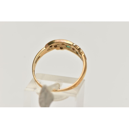 34 - A 9CT GOLD EMERALD AND DIAMOND RING, set with three circular cut emeralds, interspaced with two star... 