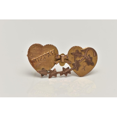 36 - A YELLOW METAL SWEETHEART BROOCH, designed as two hearts with a bow and ivy leaf detail, inscribed '... 