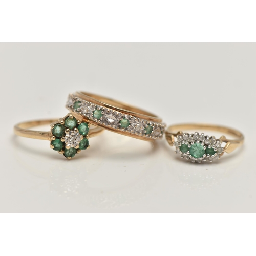 37 - THREE GEM SET RINGS, the first a full eternity band set with emeralds and small single cut diamonds,... 