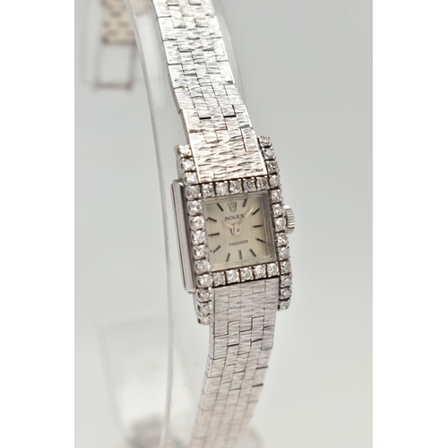 5 - A LADYS 18CT WHITE GOLD, DIAMOND SET 'ROLEX' WRISTWATCH, manual wind, round silver dial signed 'Role... 