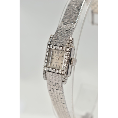 5 - A LADYS 18CT WHITE GOLD, DIAMOND SET 'ROLEX' WRISTWATCH, manual wind, round silver dial signed 'Role... 