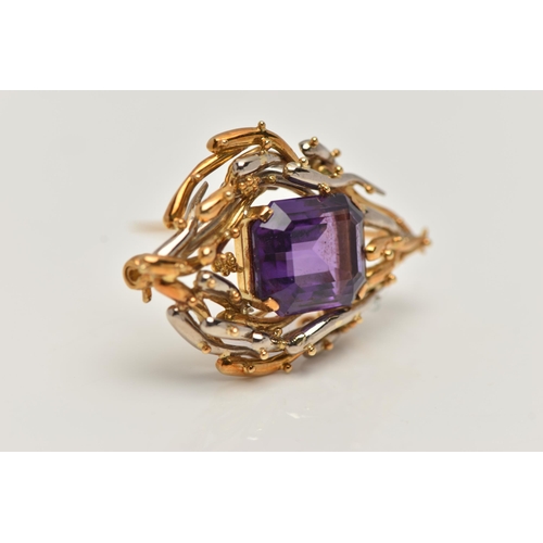 6 - AN 18CT BI-COLOUR AMETHYST BROOCH, centring on a rectangular cut amethyst with cut off corners, four... 