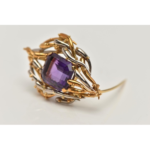 6 - AN 18CT BI-COLOUR AMETHYST BROOCH, centring on a rectangular cut amethyst with cut off corners, four... 