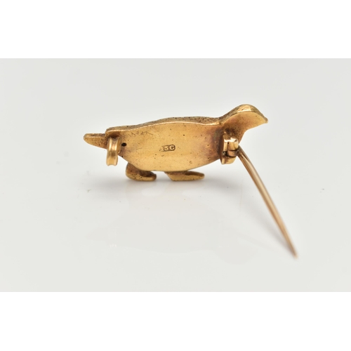 103 - A YELLOW METAL BROOCH, in the form of a textured game bird, set with a small diamond chip eye, stamp... 