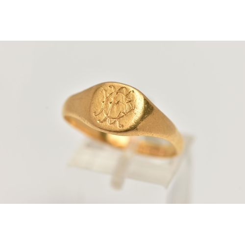 129 - A 22CT GOLD SIGNET RING, monogram engraving to the head, hallmarked 22ct Birmingham 1939, approximat... 