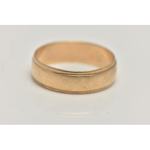 130 - A 9CT GOLD BAND RING, a wide band with a stepped edge milgrain detail, approximate width 7mm, hallma... 