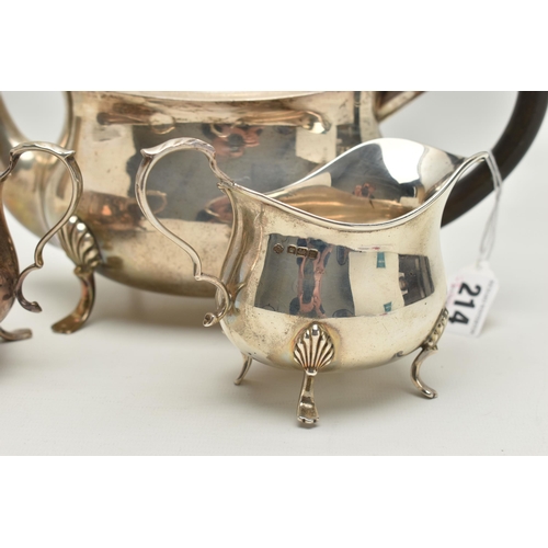 214 - AN EARLY 20TH CENTURY THREE PIECE SILVER TEA SERVICE SET, comprising of a polished teapot, raised on... 