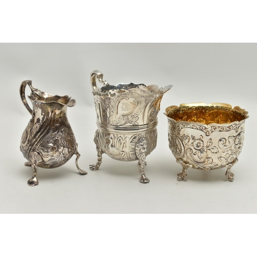 215 - THREE PIECES OF SILVER, to include a George II creamer, embossed floral pattern with engraved monogr... 