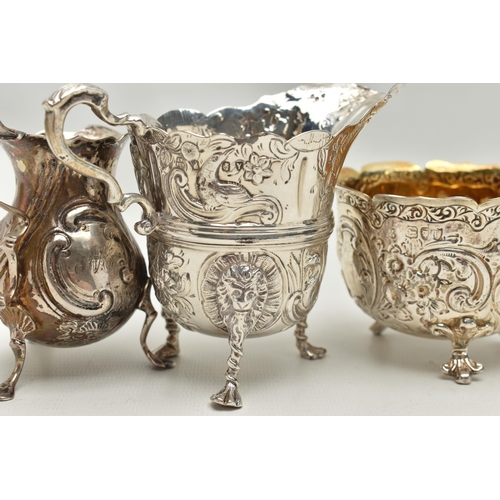 215 - THREE PIECES OF SILVER, to include a George II creamer, embossed floral pattern with engraved monogr... 