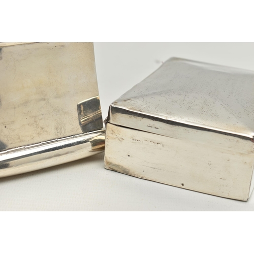 217 - A GEORGE V SILVER TOBACCO BOX AND A SILVER CIGARETTE BOX, the tobacco box of plain rectangular form ... 