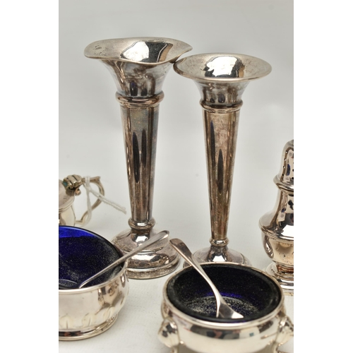 221 - A PARCEL OF 20TH CENTURY SILVER CRUET ITEMS, POSY VASES, ETC, comprising two three piece cruet sets,... 