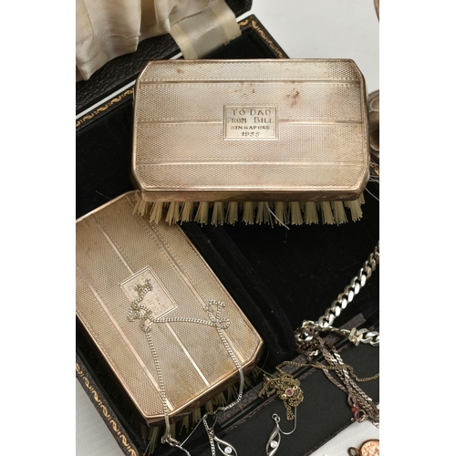 229 - A CASED TWO PIECE SILVER CLOTHES BRUSH SET AND OTHER ITEMS, the black case opens to reveal two silve... 