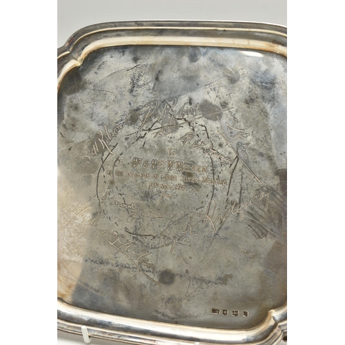 232 - AN EARLY 20TH CENTURY SILVER WAITER, of a polished square form, personal engraving to the centre rea... 