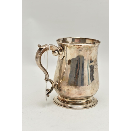 235 - A GEORGE III SILVER TANKARD, polished bell shape tankard, fitted with a scrolling handle, hallmarked... 