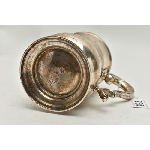 235 - A GEORGE III SILVER TANKARD, polished bell shape tankard, fitted with a scrolling handle, hallmarked... 