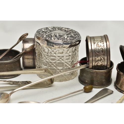 239 - A PARCEL OF SILVER ITEMS, to include six silver napkin rings, each with a full silver hallmark, a gl... 