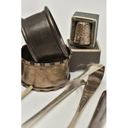 239 - A PARCEL OF SILVER ITEMS, to include six silver napkin rings, each with a full silver hallmark, a gl... 