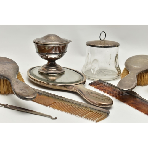 249 - A SELECTION OF SILVER VANITY ITEMS, to include a four piece, polished silver dressing table set, com... 