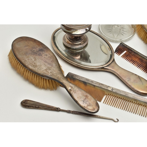 249 - A SELECTION OF SILVER VANITY ITEMS, to include a four piece, polished silver dressing table set, com... 