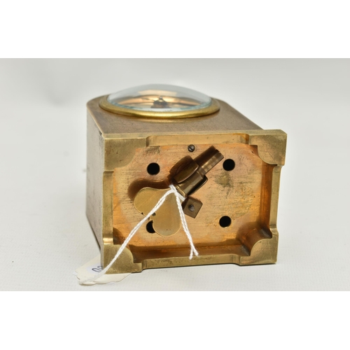 257 - A BRASS CASED ALARM CLOCK, key wound, round gold dial, Roman numerals, in a brass case, together wit... 