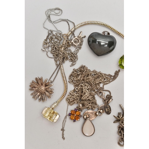 66 - AN ASSORTMENT OF WHITE METAL JEWELLERY, to include three bracelets, three necklaces, four pendants a... 