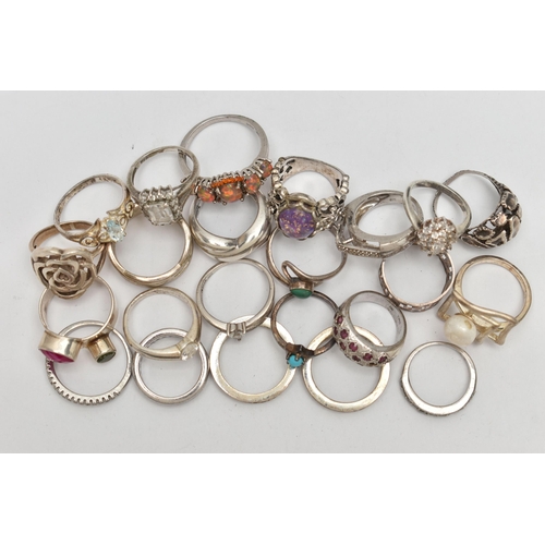 72 - AN ASSORTMENT OF WHITE METAL RINGS, twenty three rings of assorted designs, some stamped 925, approx... 