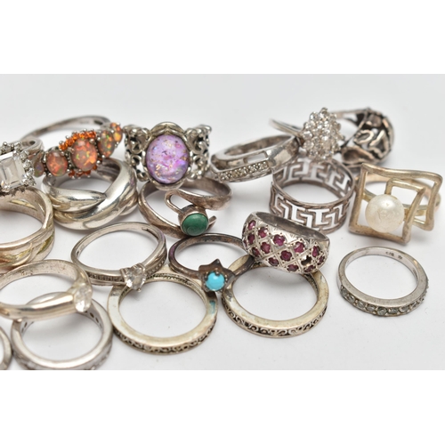 72 - AN ASSORTMENT OF WHITE METAL RINGS, twenty three rings of assorted designs, some stamped 925, approx... 