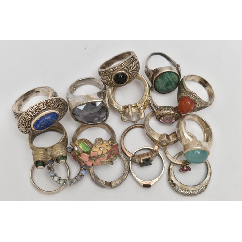 73 - AN ASSORTMENT OF WHITE METAL RINGS, seventeen rings and a circular pendant, some stamped 925, approx... 