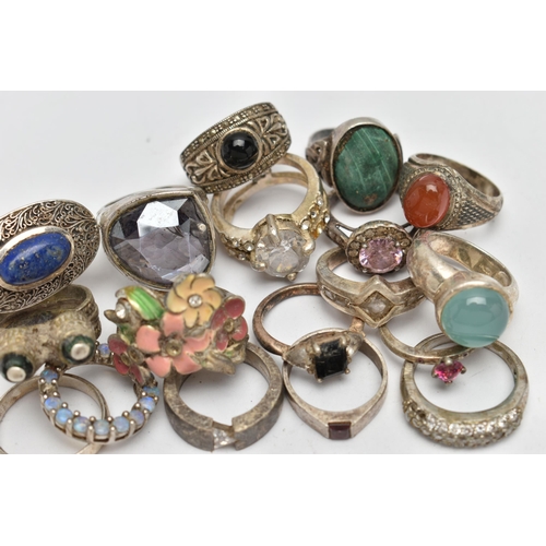 73 - AN ASSORTMENT OF WHITE METAL RINGS, seventeen rings and a circular pendant, some stamped 925, approx... 