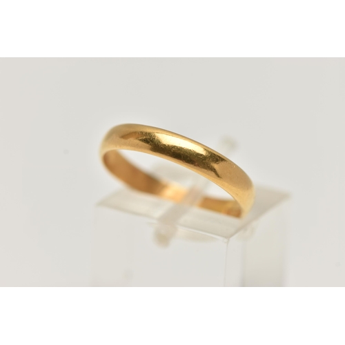 86 - A POLISHED 22CT GOLD BAND RING, approximate band width 3.3mm, hallmarked 22ct London, ring size O 1/... 