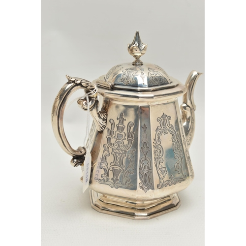 261 - A MID VICTORIAN SILVER TEAPOT, engraved floral and foliate pattern, fitted with an ivory insulated s... 