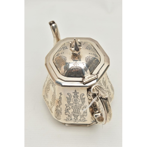 261 - A MID VICTORIAN SILVER TEAPOT, engraved floral and foliate pattern, fitted with an ivory insulated s... 