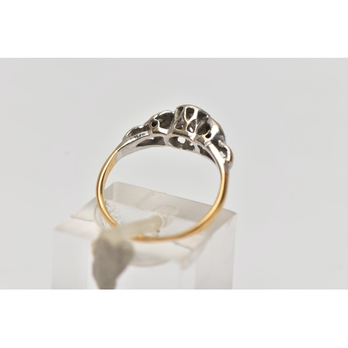 264 - A DIAMOND RING, a single round brilliant cut diamond set within a white metal mount with scrolling d... 