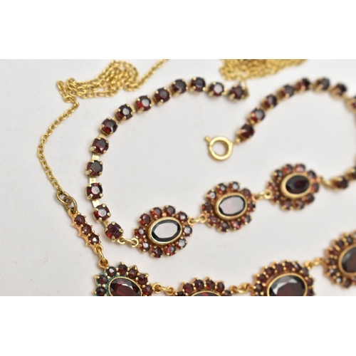 271 - A YELLOW METAL GARNET NECKLACE AND A BRACELET, the necklace fitted with five oval garnet cluster lin... 